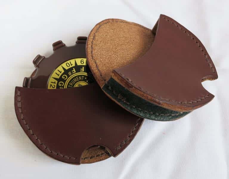 Front and back view of brown leather pitch pipe holster