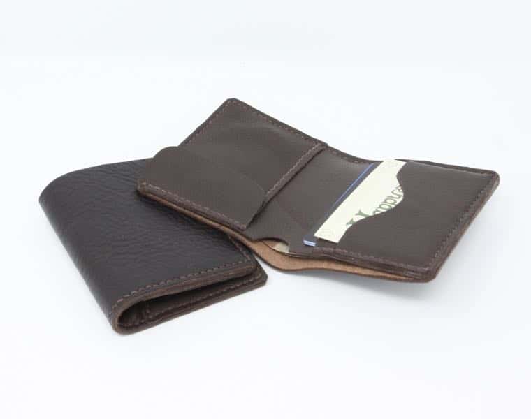 Small brown leather wallet with coin pocket. Shown open and closed.
